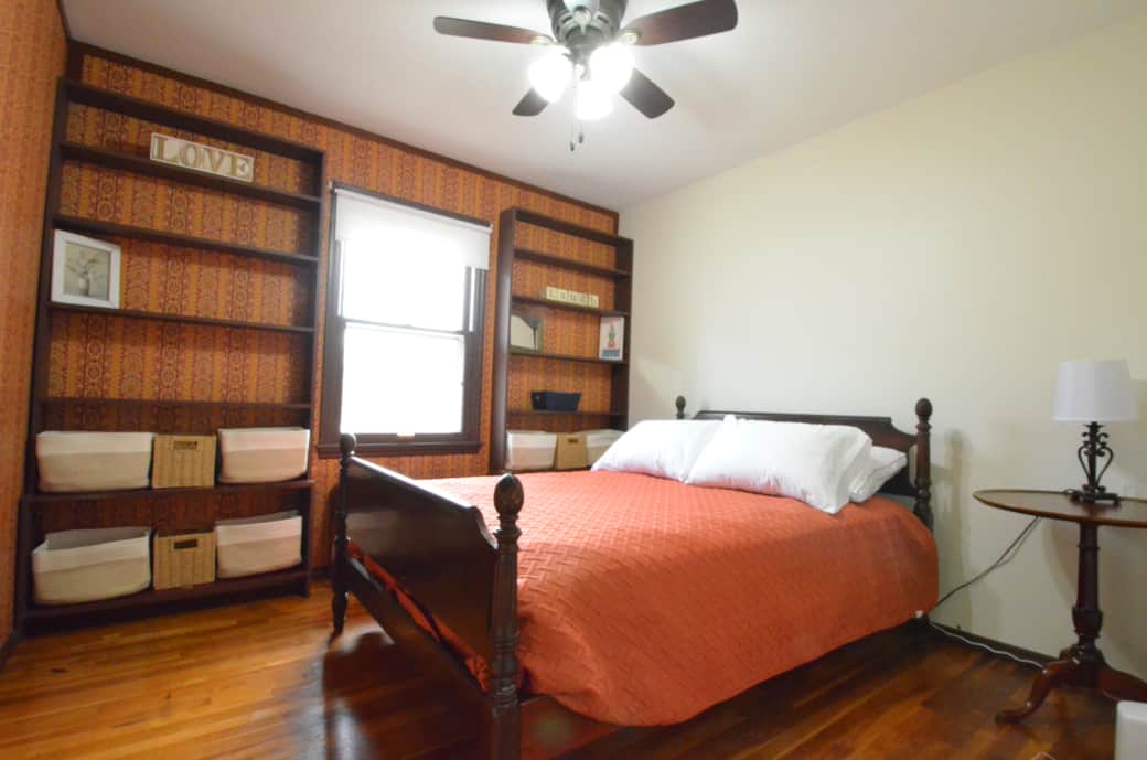 Red Room - Full size bed, storage in the built-in shelves, Roku TV and power for your devices.