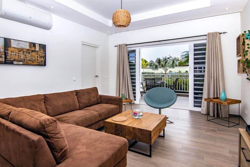 View of the terrace and over the resort from the inside. Air conditioning in the living room.