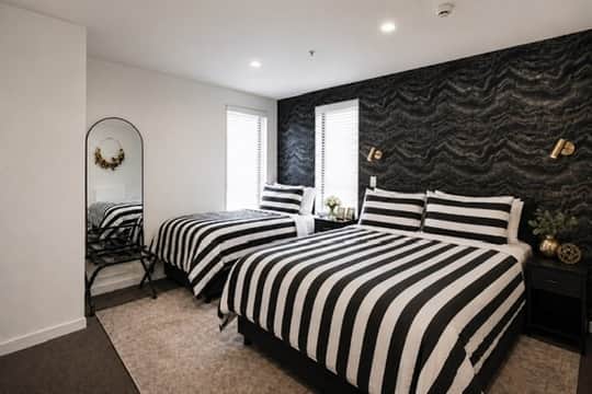 Sleep soundly on a queen and single bed, each featuring a comfortable pillowtop mattress and quality