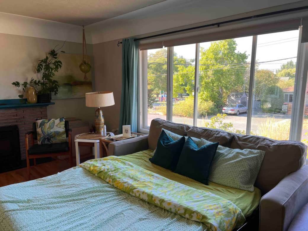 Queen, pull-out sofa bed in the living room.
