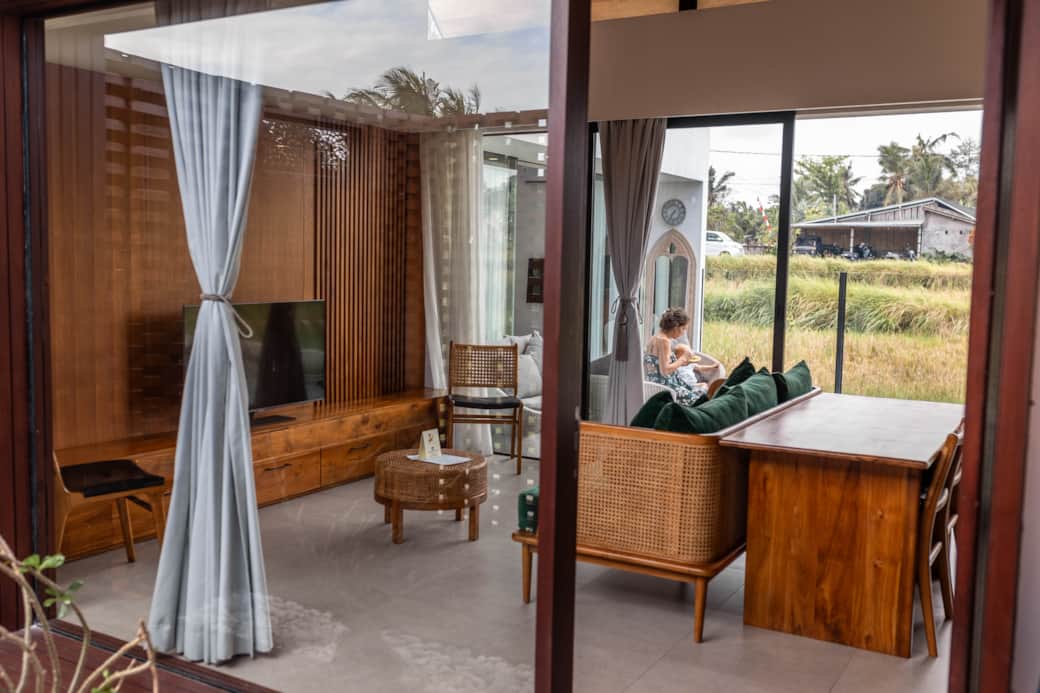 Living room with smart TV and full kitchenette