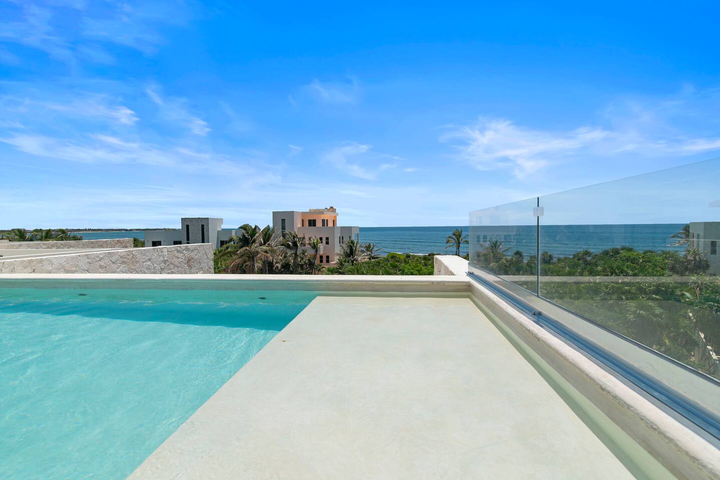 Elevate your stay with stunning Caribbean Sea views from our exclusive rooftop pool. Dive into paradise!
