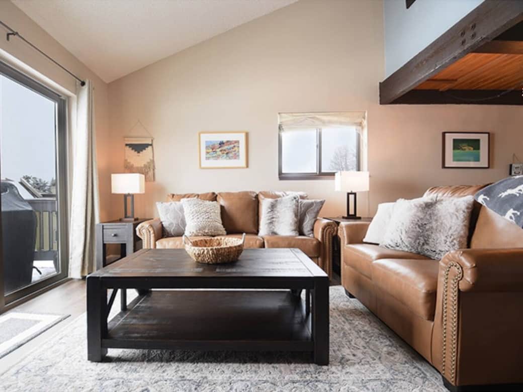 Open concept living with a woodburning fireplace and mountain views of Byers Peak, perfect for hosting, cooking, and relaxing with the whole family. Open concept living with a woodburning fireplace and mountain views of Byers Peak, perfect for hosting, cooking, and relaxing with the whole family.