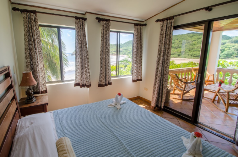 Master bedroom with private with ensuite and balcony