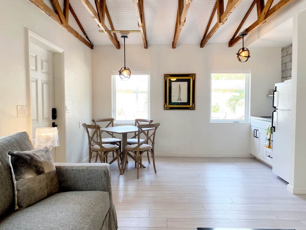Updated dining area in Unit 2 at Casa Citron featuring a refined layout that enhances flow, comfort, and usable guest space.