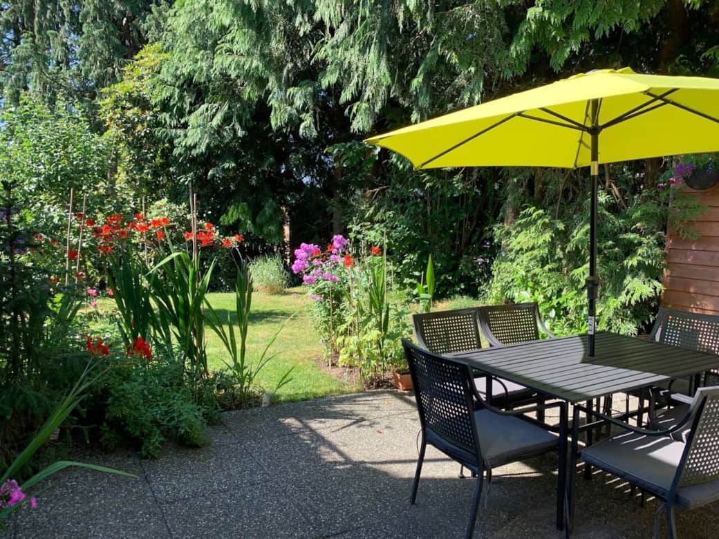 Unwind on our private backyard terrace Unwind on our private backyard terrace