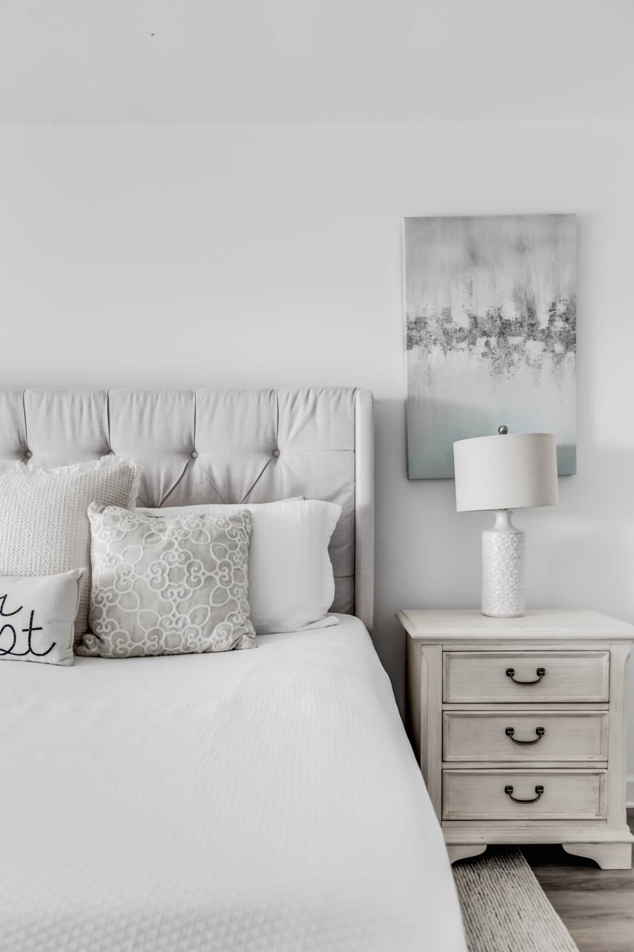 Master bedroom on the first floor with private bathroom.