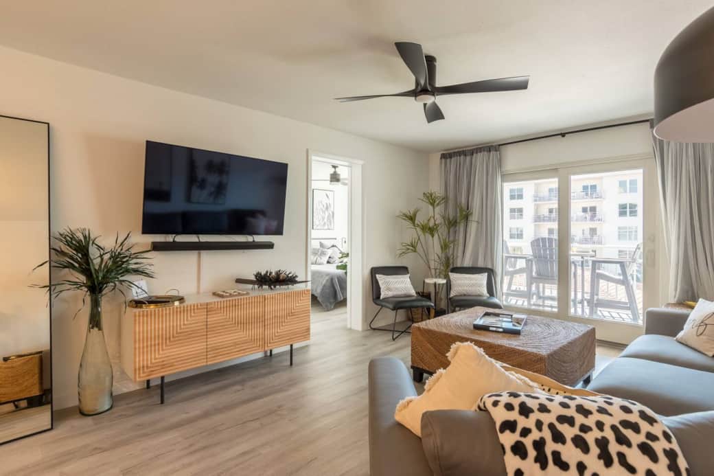 Ample room for the whole family to gather for games or a movie in this open concept floor plan living room.