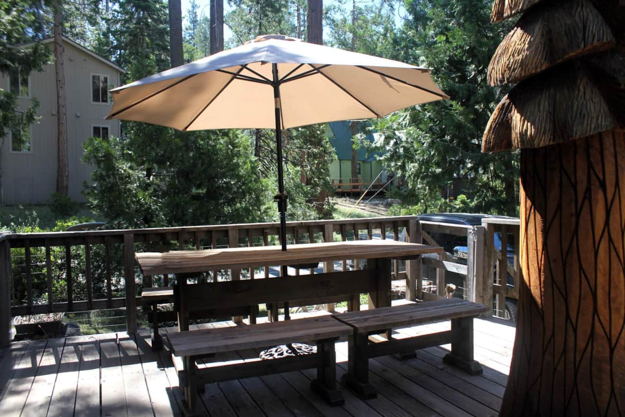 Shaded dining set ready for outdoor meals