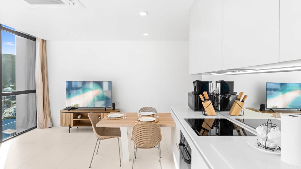 Dining Room Area + Kitchen