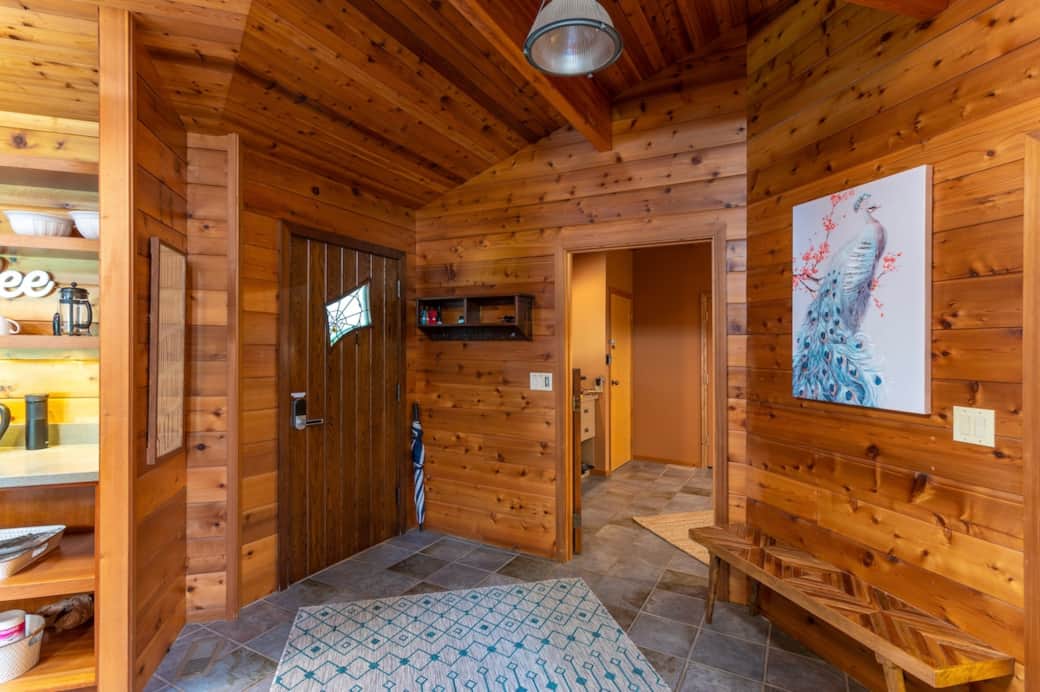 Main entryway into house. Smart lock on front door- where you will enter your unique code to enter. Pass through laundry room into large 2 car garage. Main entryway into house. Smart lock on front door- where you will enter your unique code to enter. Pass through laundry room into large 2 car garage.