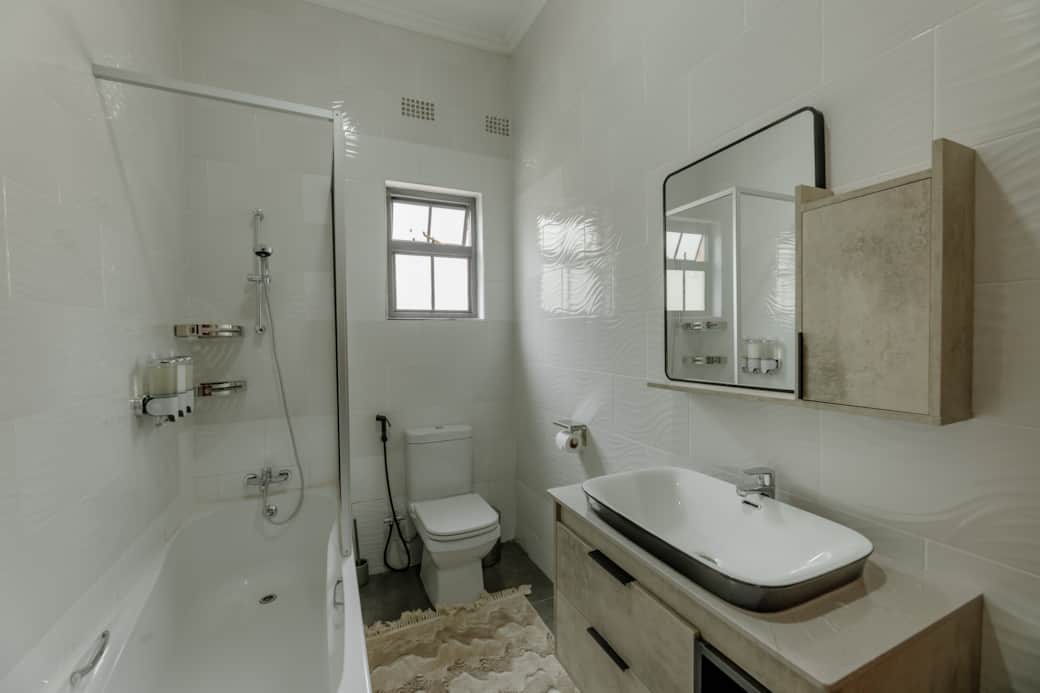 Modern bathroom with bathtub and shower