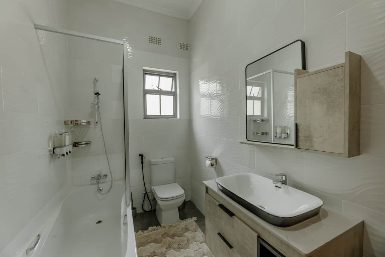 Modern bathroom with bathtub and shower