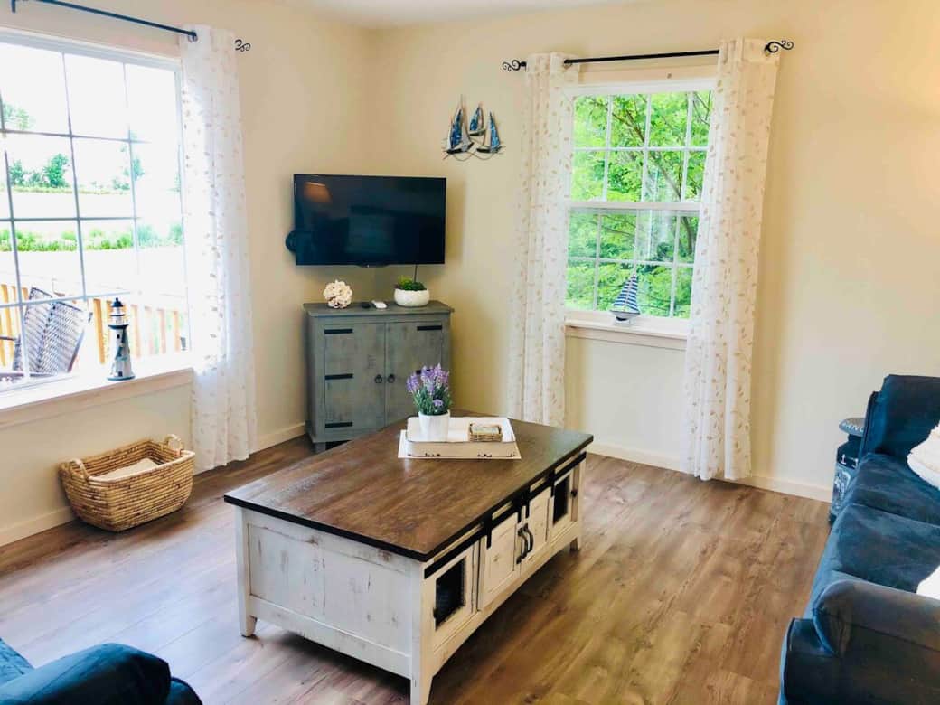 Living room with couch, loveseat, games and smart tv (NO CABLE) Living room with couch, loveseat, games and smart tv (NO CABLE)