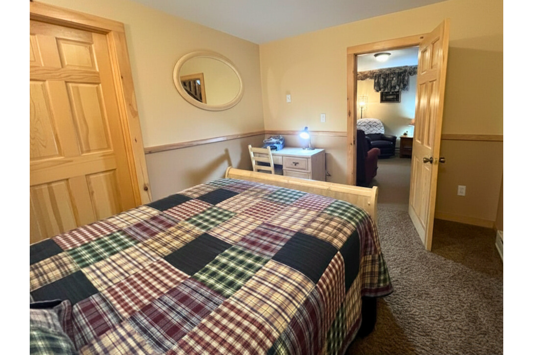 Bedroom 4, lower level. Full sized bed. 