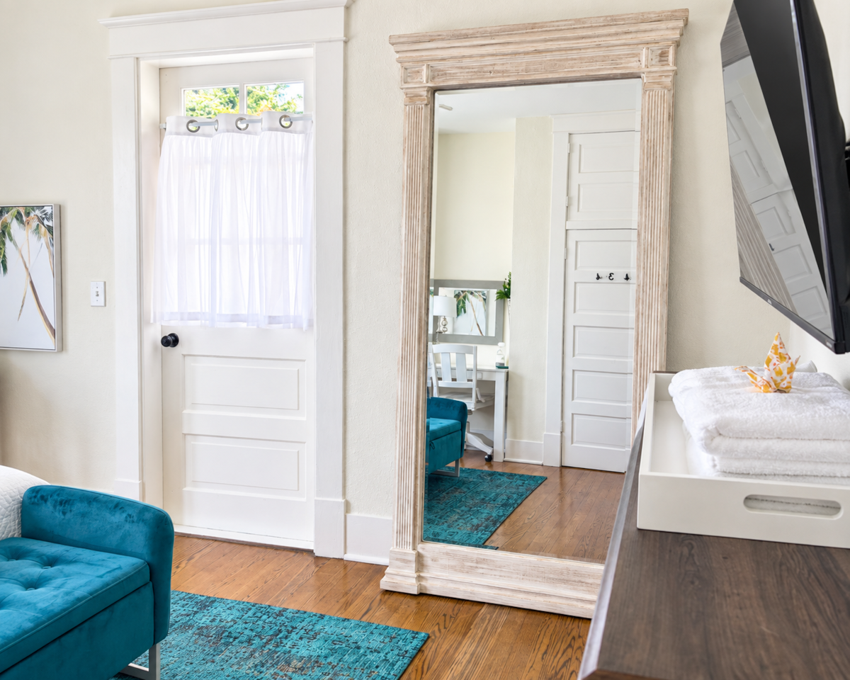 Bridal prep-station with swivel chair and a nearly 7' mirror for primping and posing.