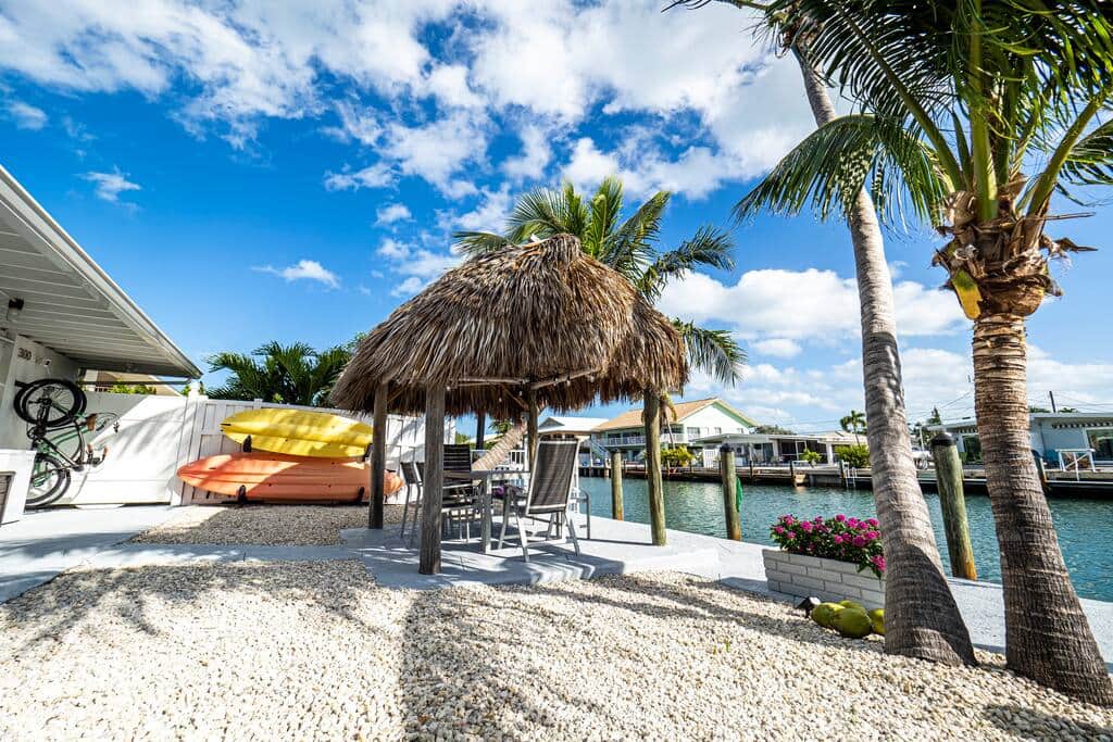 Backyard - Where the day ends up happening: a shaded tiki hut, lounge seating, bikes ready to go and