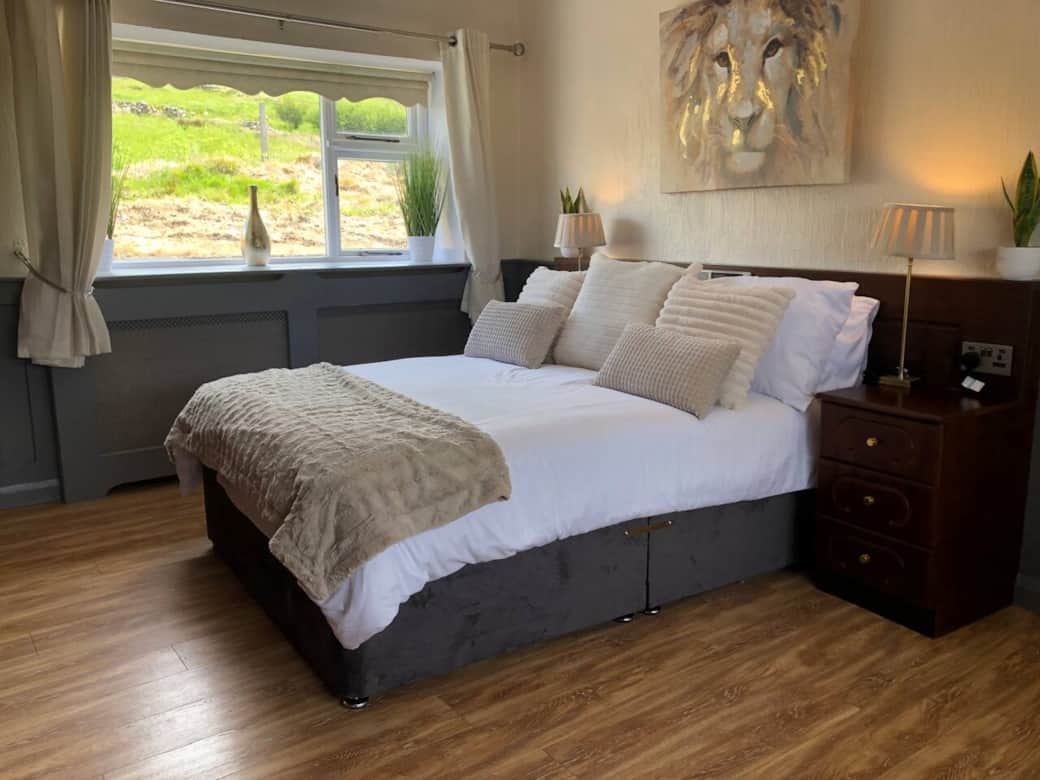 Bedroom number 1 is bright and cosy with a double orthopaedic bed, loads of built in storage space, oil heating and fantastic views from two large windows. 