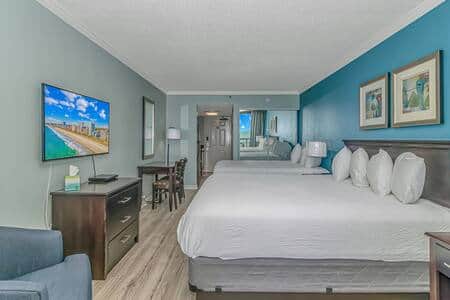 Cozy and inviting space with smart TV, dining/work desk, and plenty of room to relax.