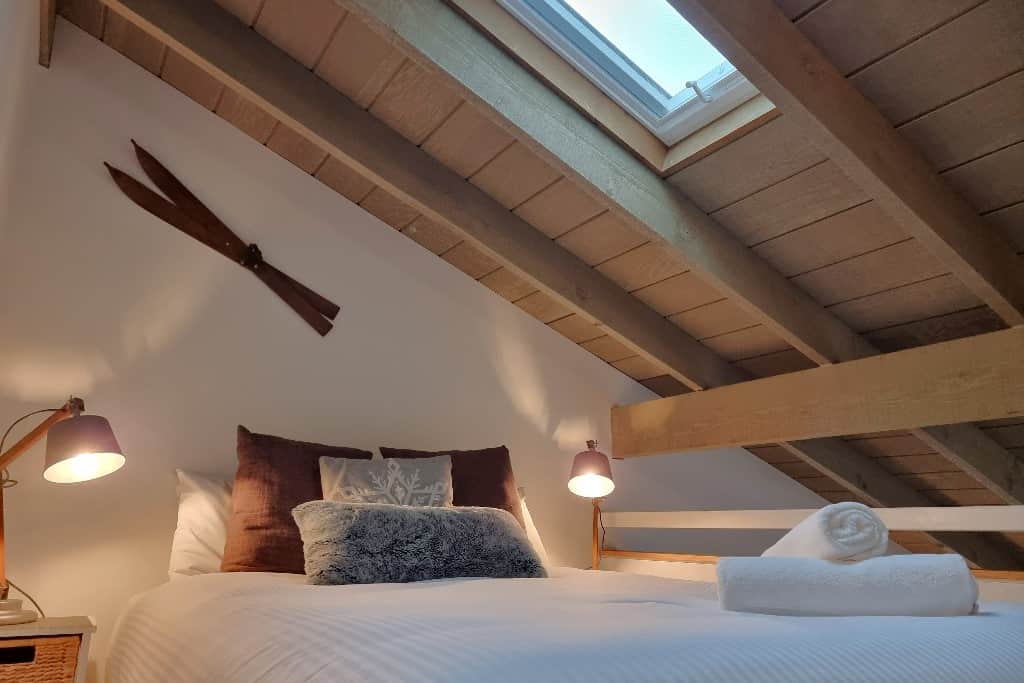 Loft queen bed with opening skylight