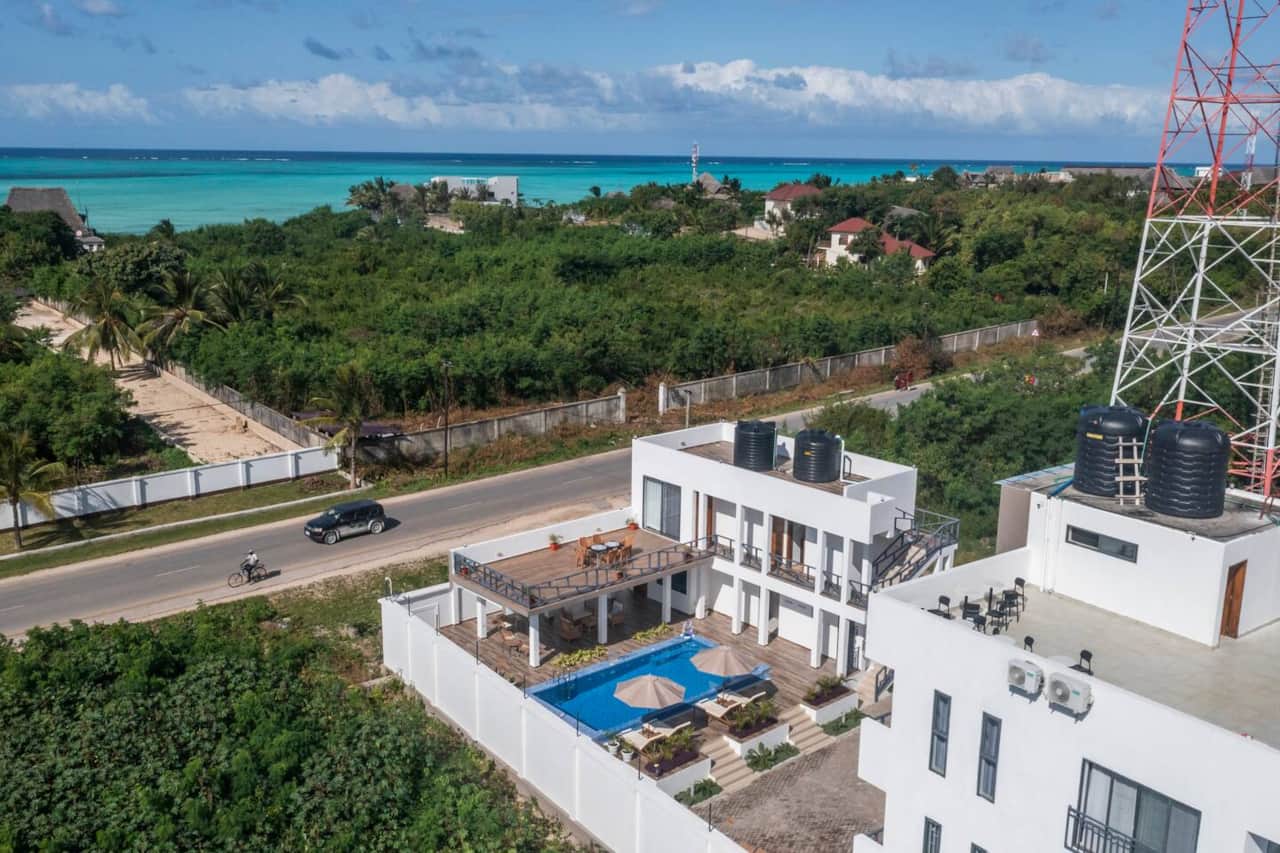 View the beach and Sunset at The rooftops