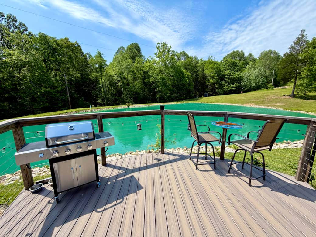 A brand new griddle/grate combo grill and seating for two with extraordinary views