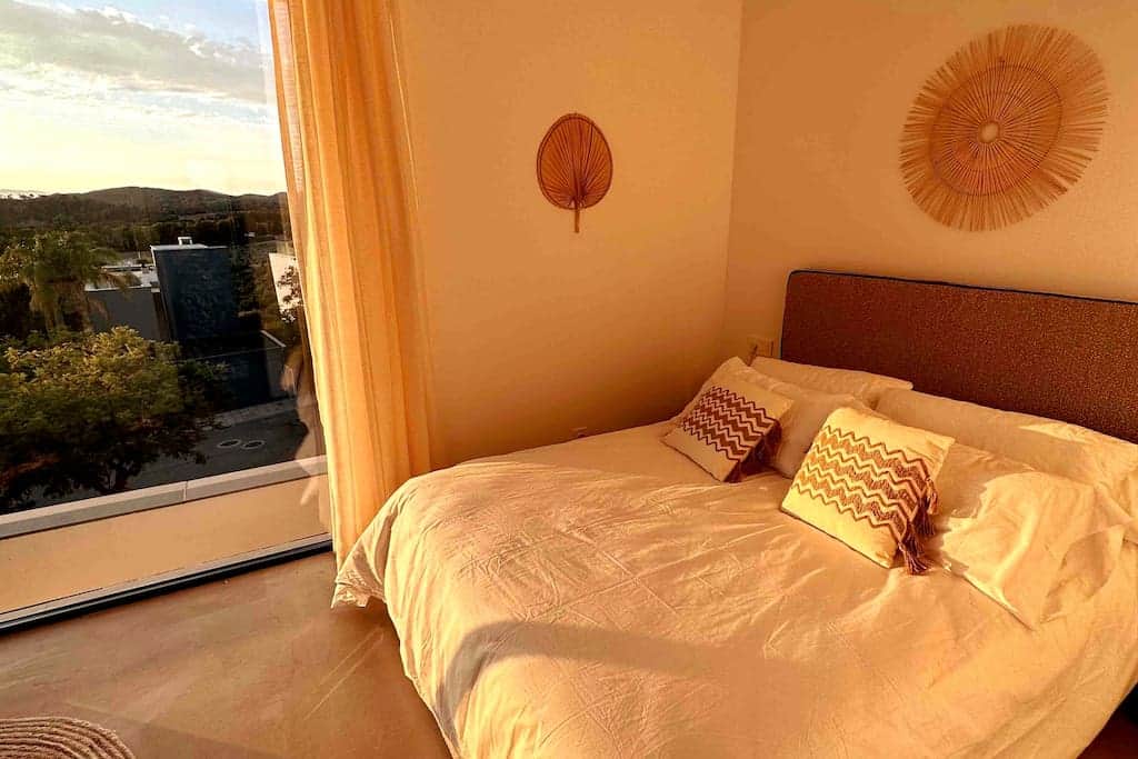 Bedroom 1 makes the most of the light at sunset.