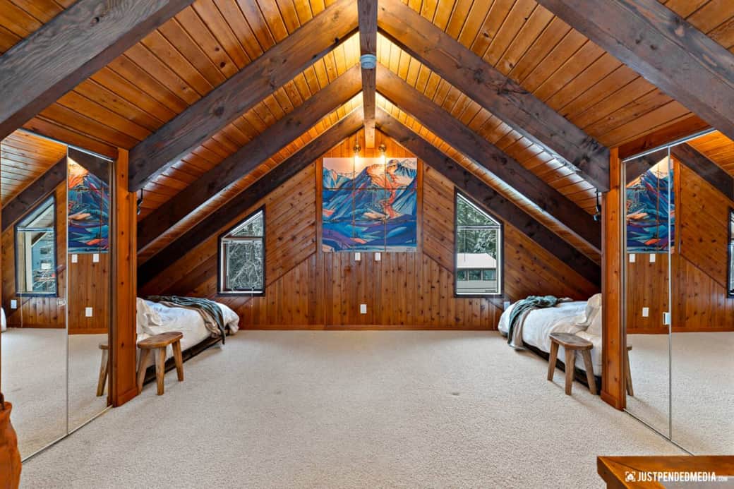 loft bedroom with 2 queen beds & 2 fold out twin beds