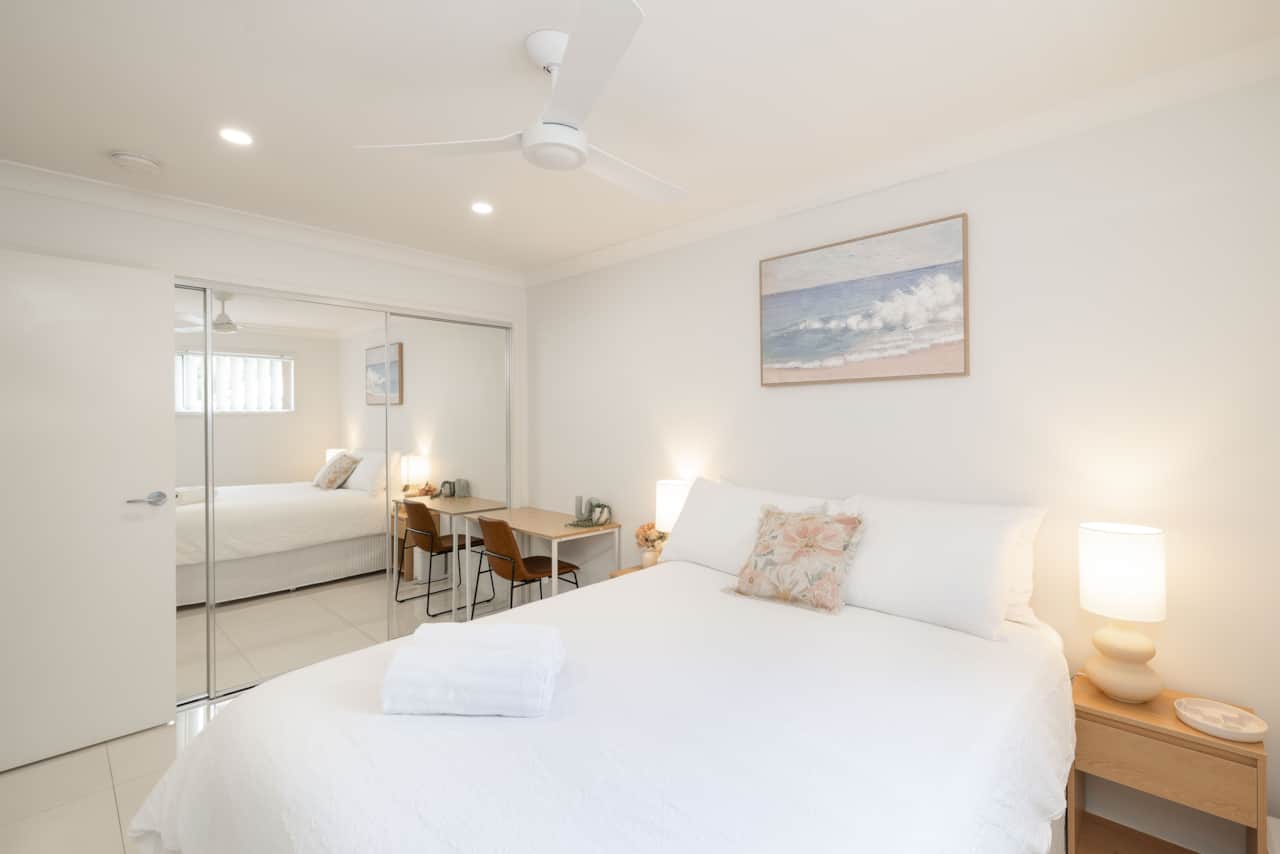 Bedroom: Peaceful bedroom with cozy design and ample storage 