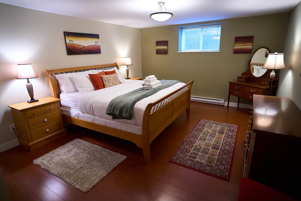 Retreat to the massive master bedroom, equipped with ample dresser and closet space Retreat to the massive master bedroom, equipped with ample dresser and closet space