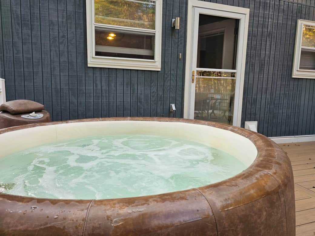 Soak in the bubbling hot tub on the spacious deck. Enjoy privacy, fresh mountain air, and the perfect spot to relax morning or night.