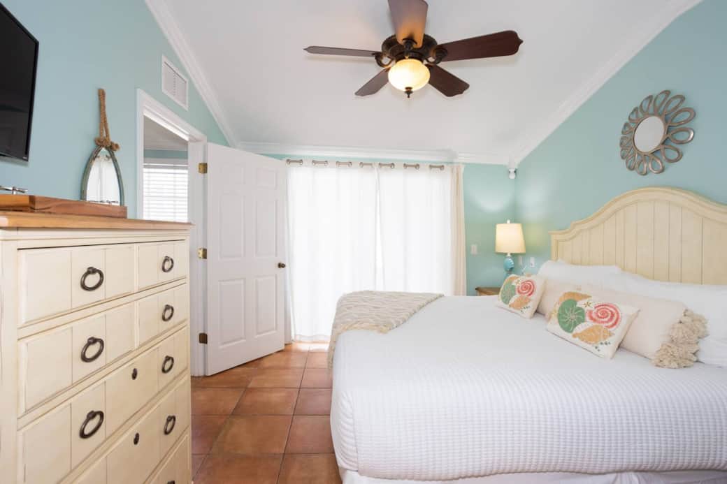 Coastal calm in a king room—memory-foam bed, crisp linens, thick fluffy towels, pure seaside luxury.