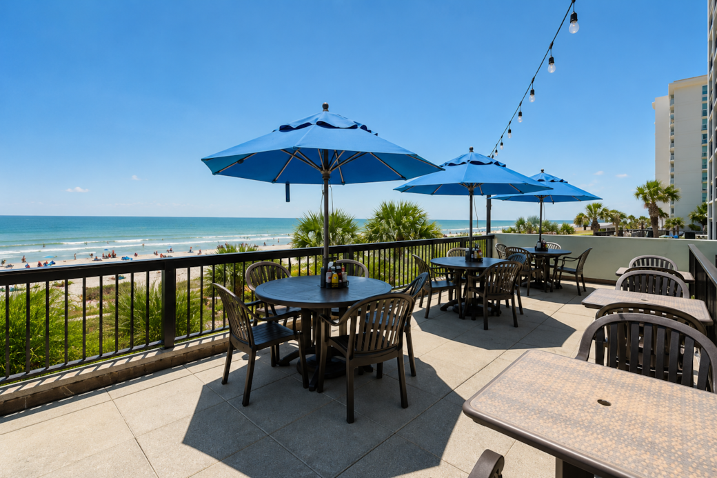 Oceanfront Terrace with Umbrellas
