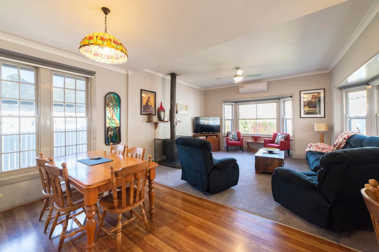 Spacious living area blends comfort & style for a delightful stay.