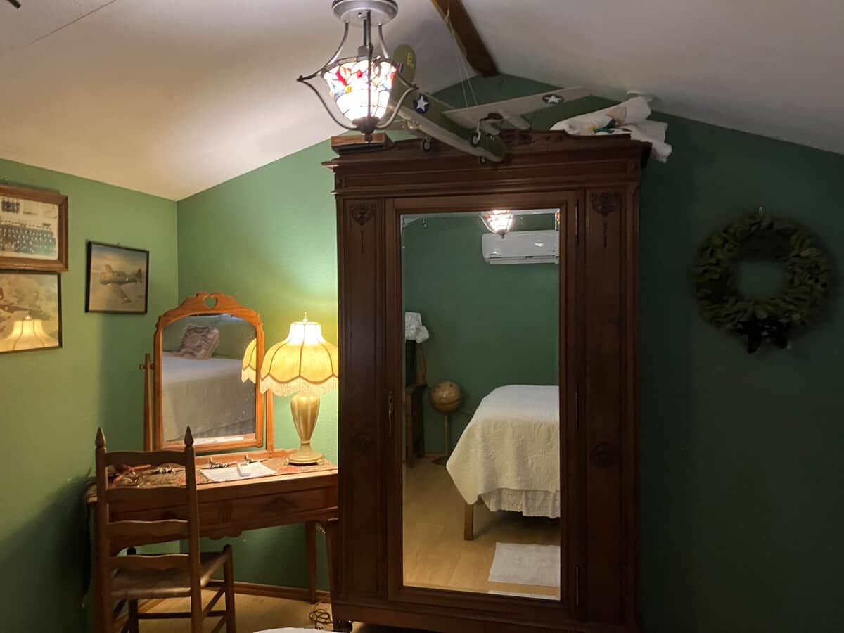The desk and antique “knock down” armoire 