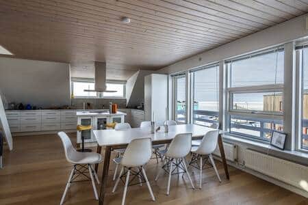 1. floor with dining room, kitchen, seaview and balcony access
