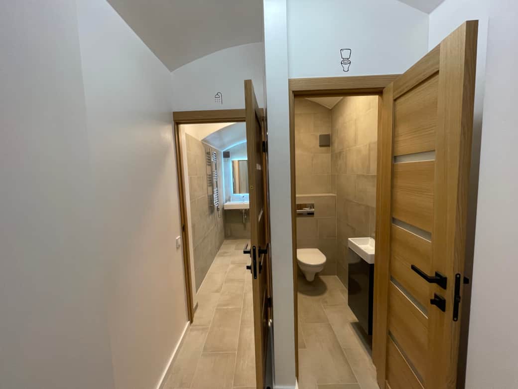 Shared toilet and shower area