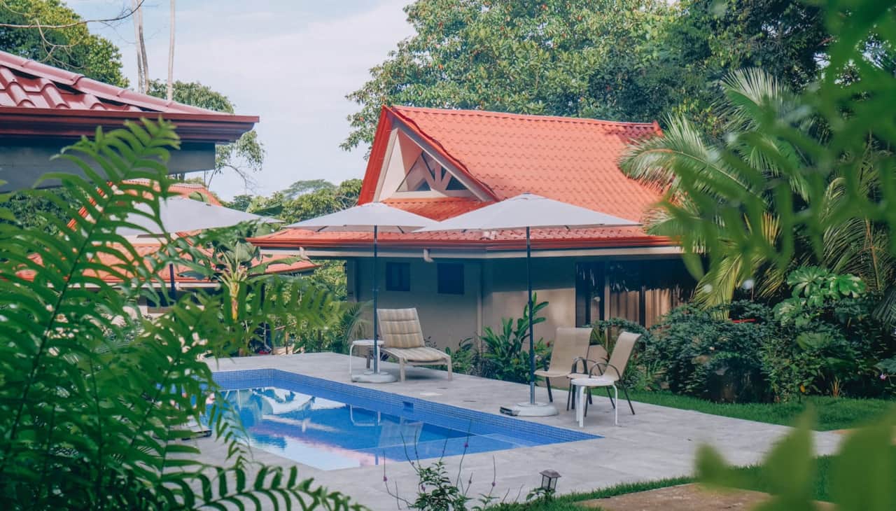 Pool area with lounge chairs