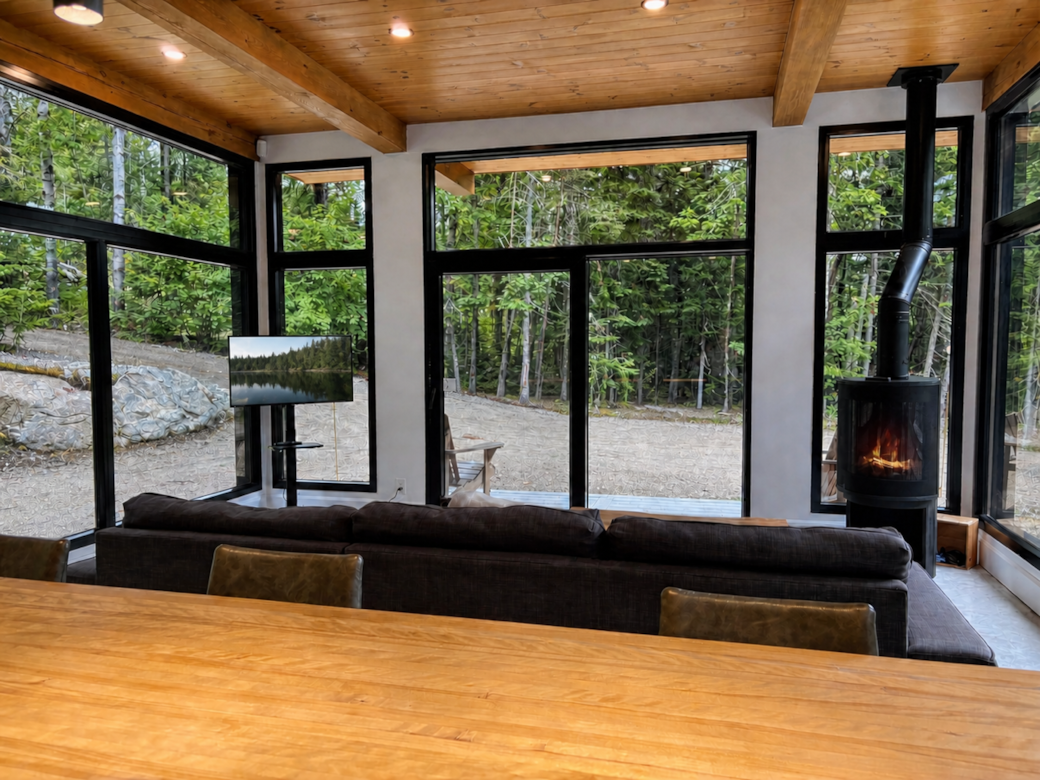 Living room with TV and gas fireplace