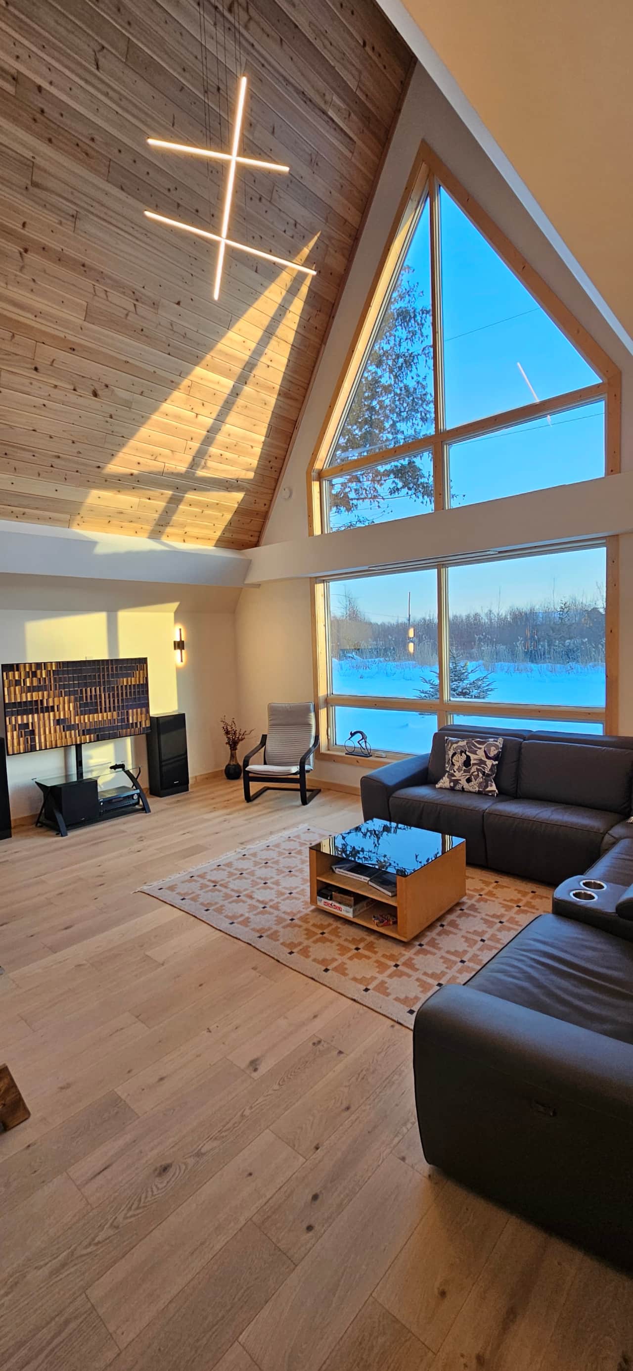 Soaring 20-Foot Vaulted Wood Ceilings and Floor-to-Ceiling Windows with Forest Views