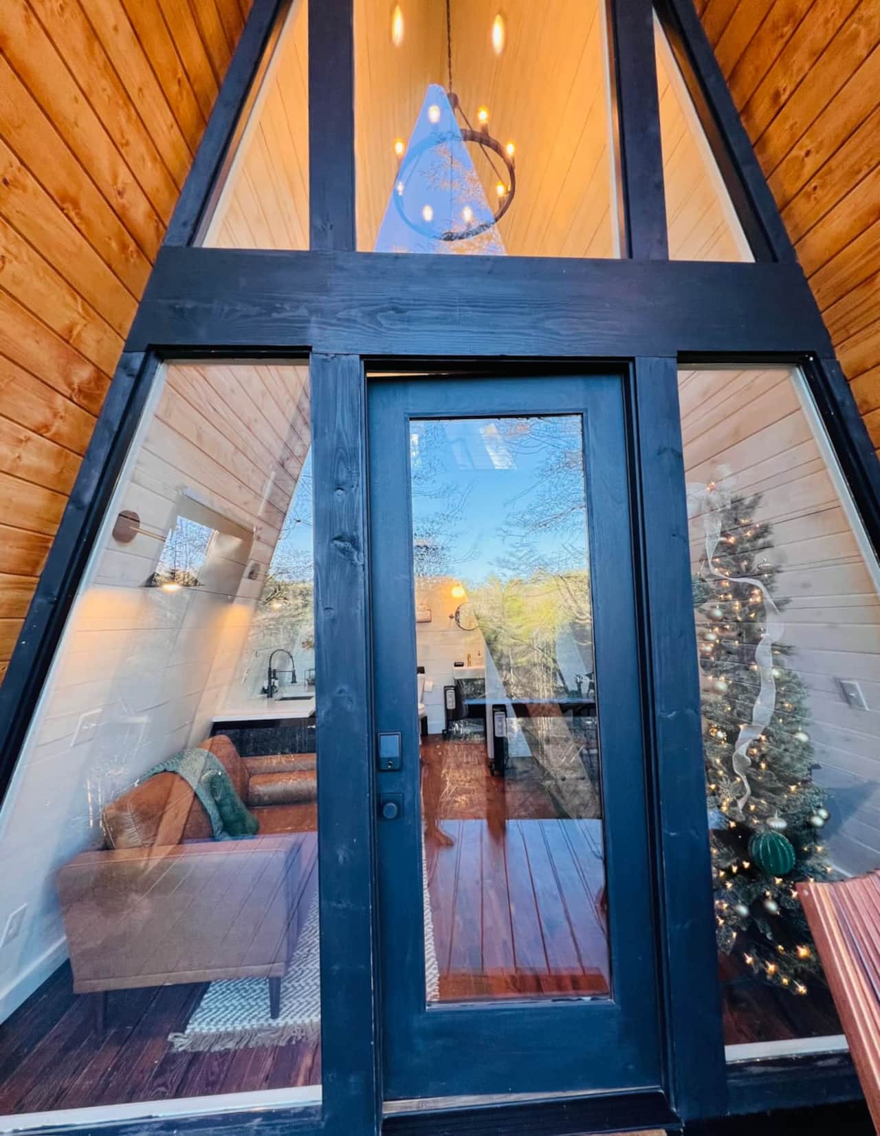 Floor-to-ceiling glass welcomes the outdoors in.