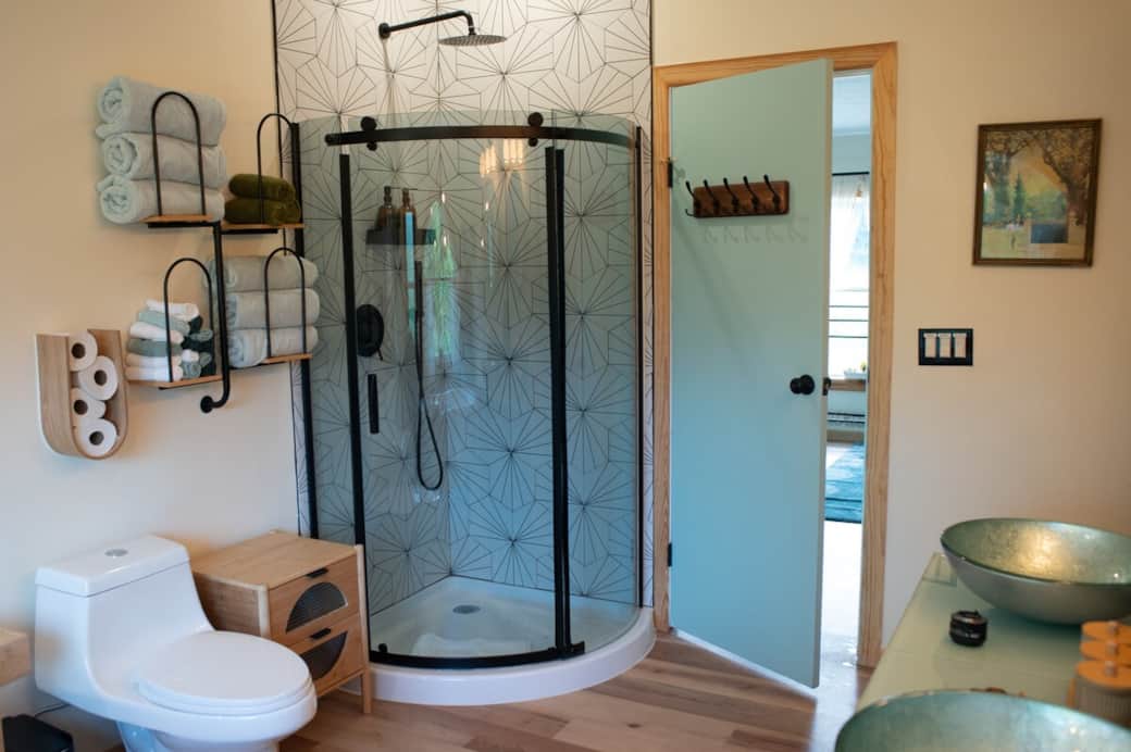 This en suite bathroom offers lasting comfort, with dual hot water heaters ensuring an endless supply. Whether it’s a long, steamy shower or a deep, soothing soak, there’s always hot water for everyone. 