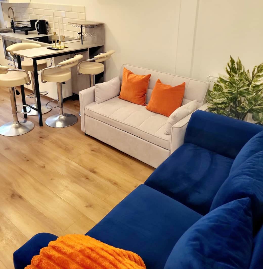 Two comfortable sofa beds in the living room, perfect for extra guests and flexible sleeping arrangements.