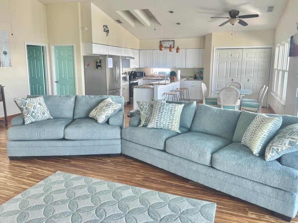 Family room open from kitchen with 55" TV, DVD player, books and games!