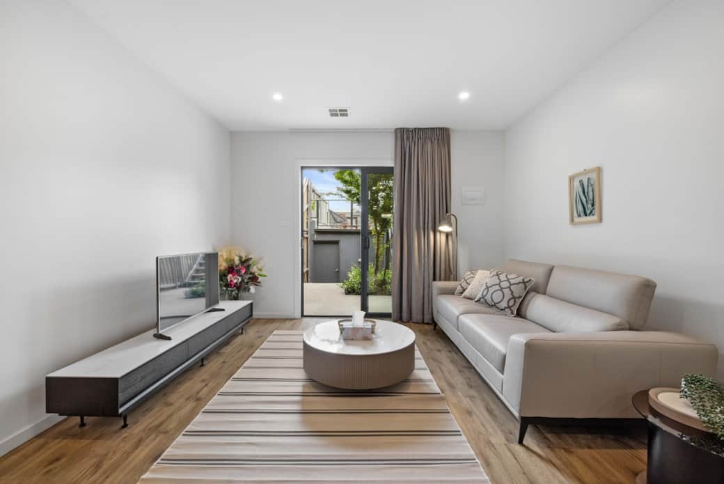 Our living room is a haven of tranquility, bathed in natural light. Featuring a tasteful mix of textures and colors, creates a calming atmosphere. It's an ideal space to start your day with a cup of morning coffee or end it with a peaceful evening
