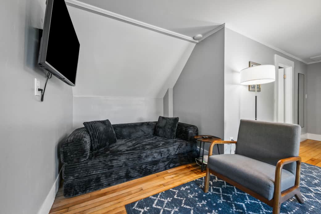 A queen size sleeper sofa and smart tv. A queen size sleeper sofa and smart tv.