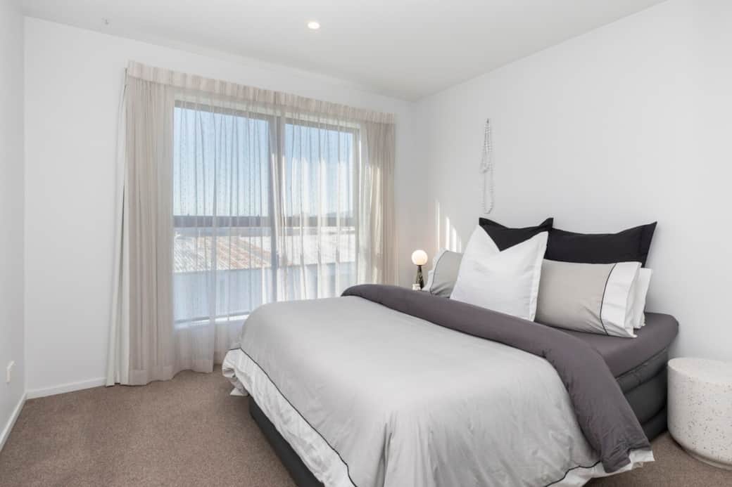 King bedroom with wardrobe. This room can be configured with two single beds on request.