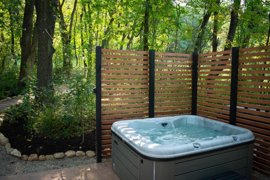 4 Person hot tub with privacy fence and lights to enjoy at night. 4 Person hot tub with privacy fence and lights to enjoy at night.