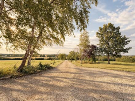 A view across the grounds of The Cotswold Barn