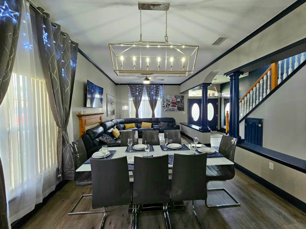 Formal dinning table, living room and staircase Formal dinning table, living room and staircase
